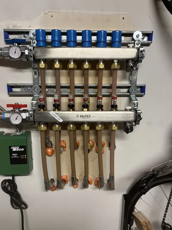 Plumber performing Water Heater Repair at a residential property in Park Ridge